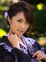 Naked asian beauty shows off her plump petite boobs in a kimono